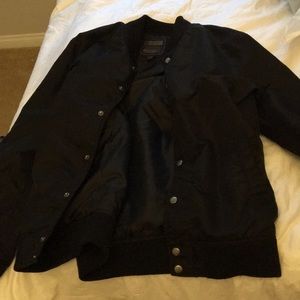 black windbreaker